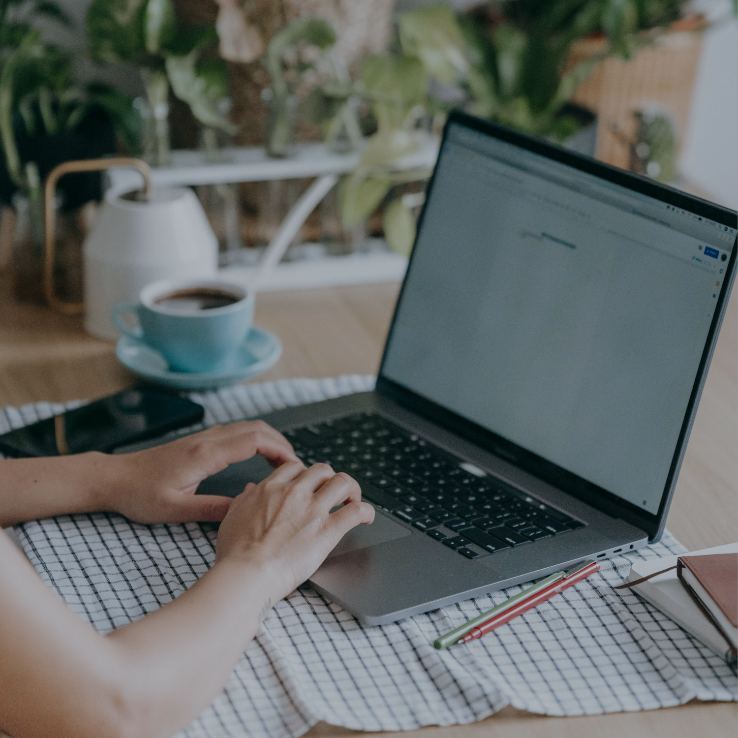 Person typing on laptop