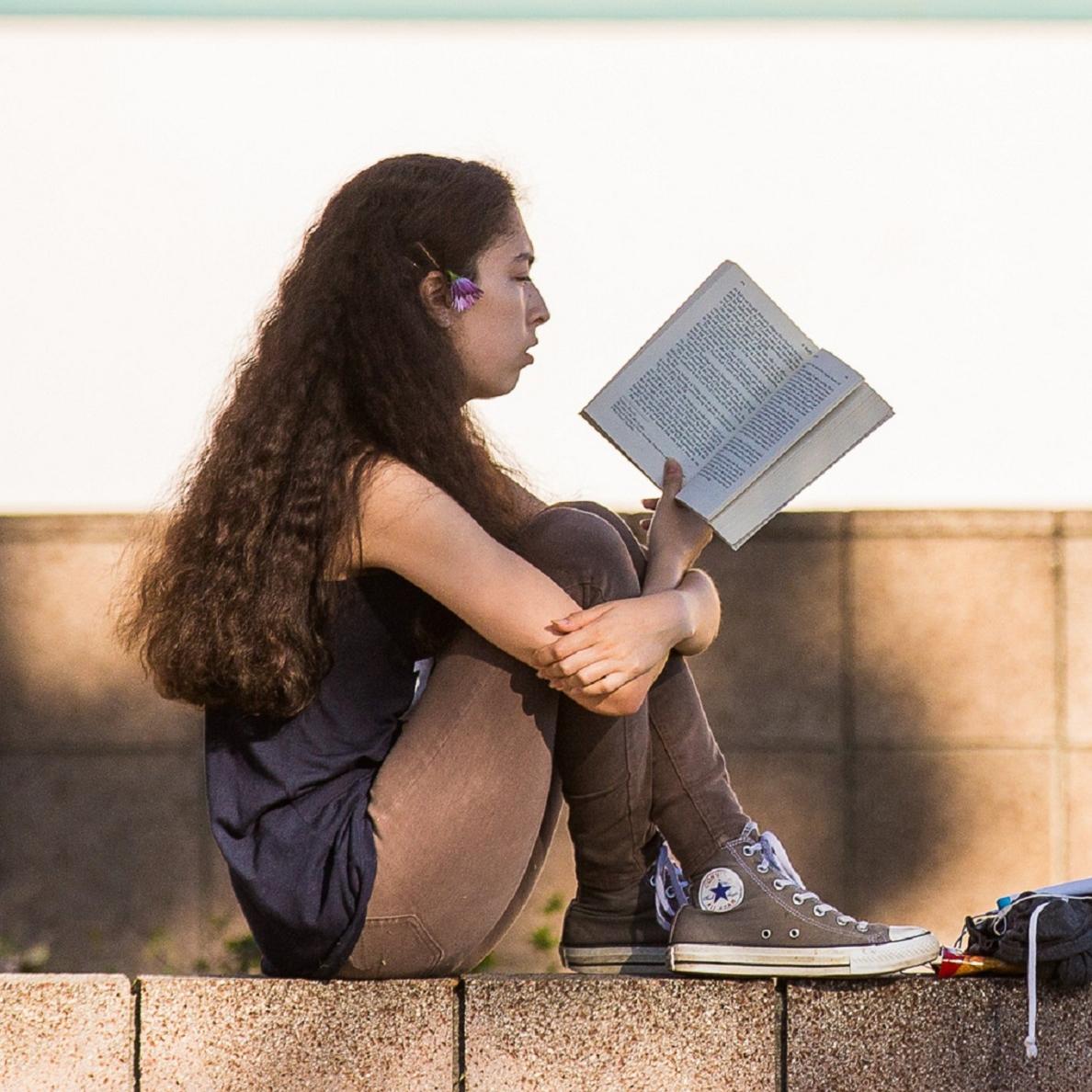 Student reading a book