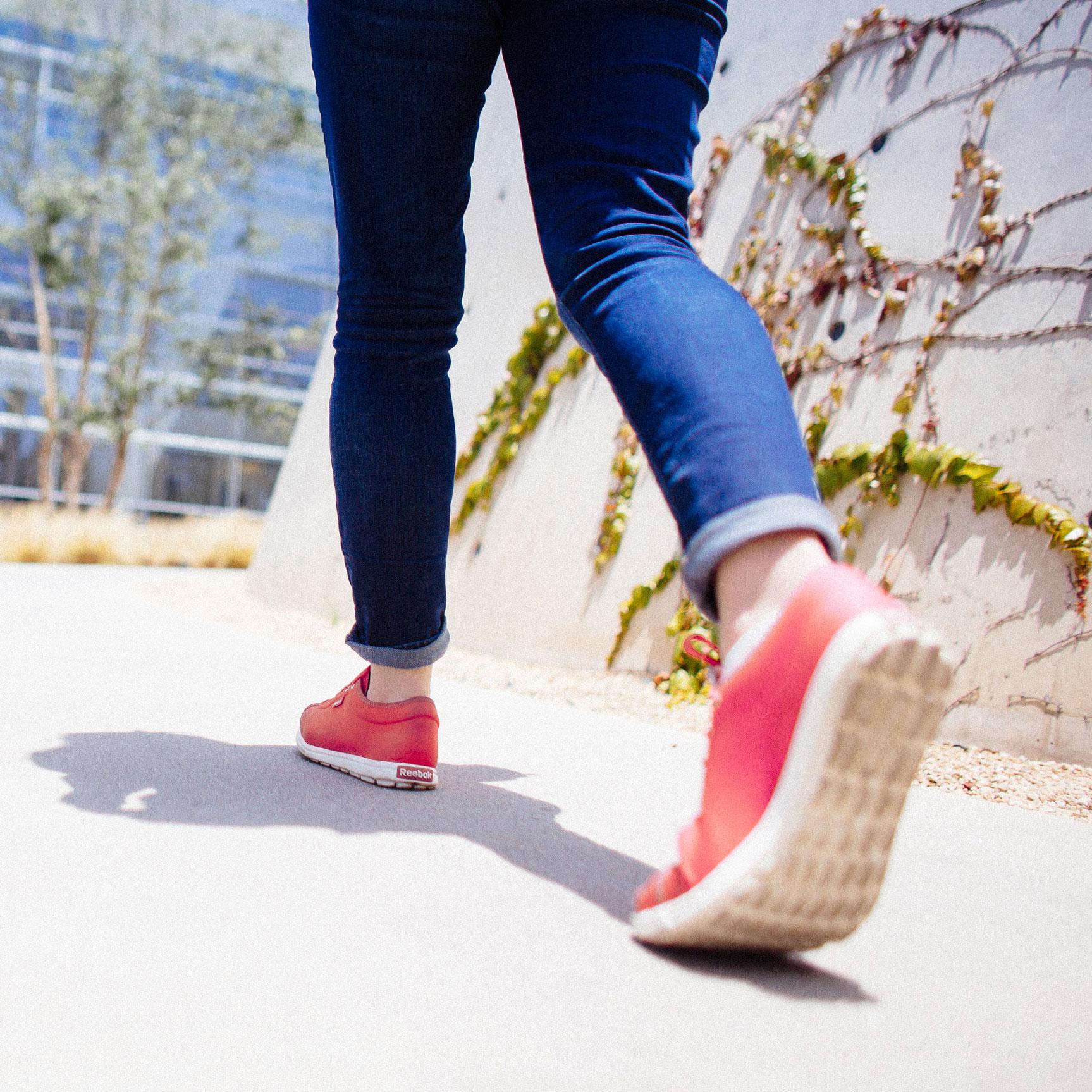 Student walking on a path