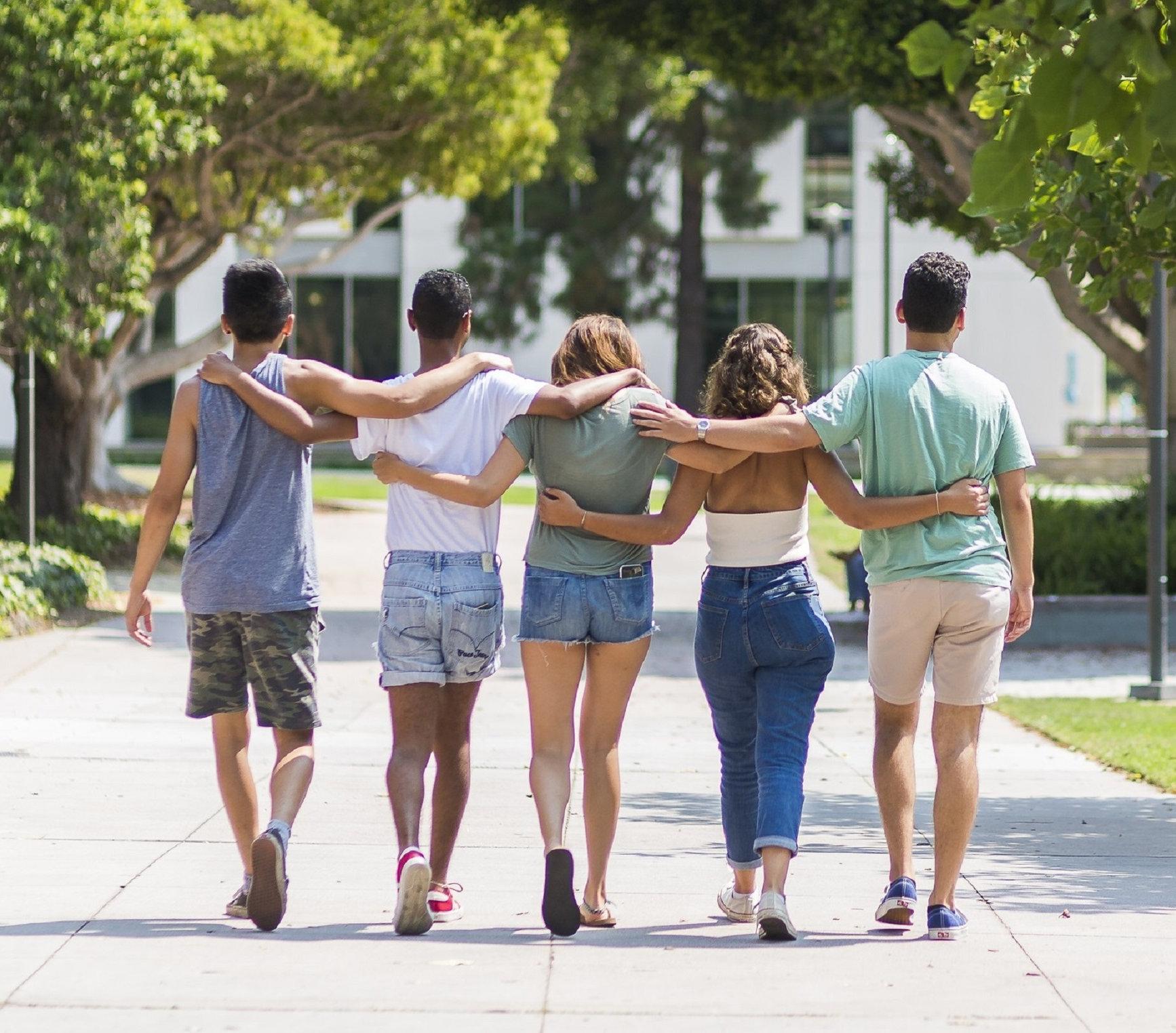 Students walking. on a path